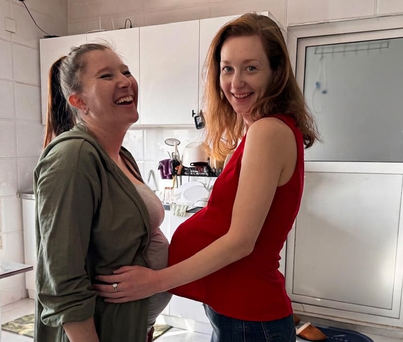 Two friends laughing together